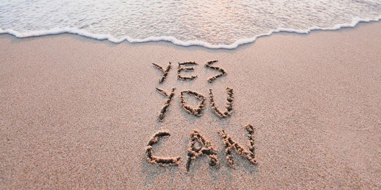 inspirational message on a beach