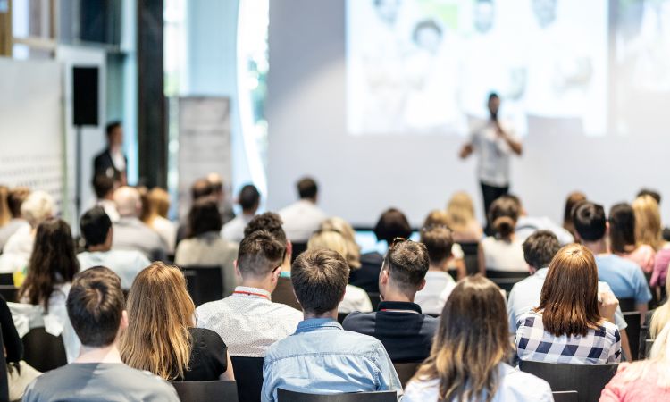 audience sitting at a conference