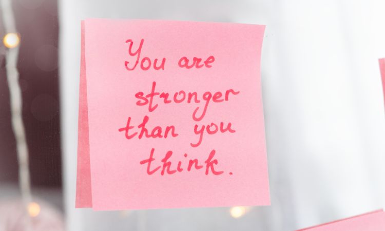 positive self affirmation sticky note on a mirror